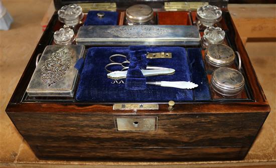 A Victorian ladies coromandel travelling toilet box, with plated accessories